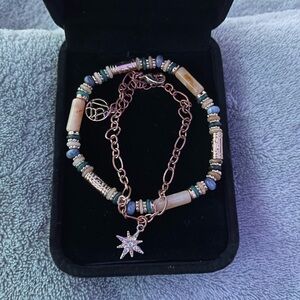 Gold and Blue Bracelet with Beads and Starburst Charm